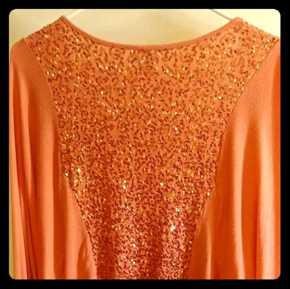 Peach sequined shrug